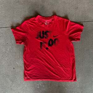 Red just do it Nike tee